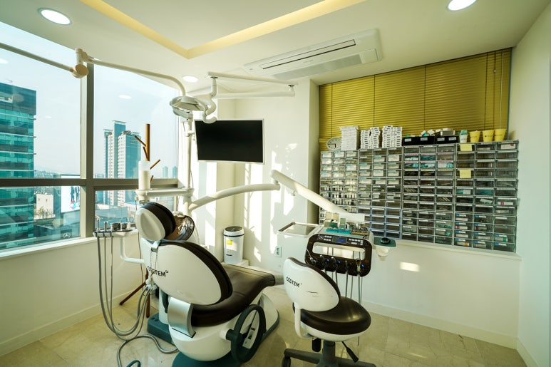 Implant Dental Insurance  Seok Plant Dental Hospital image 1