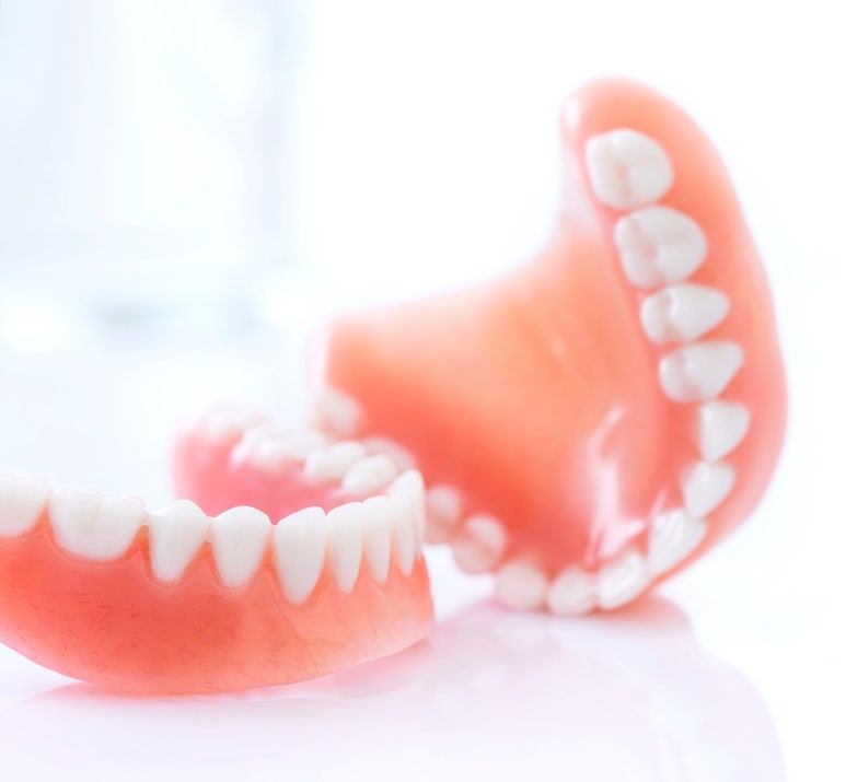 Janghanpyeong Station Dental Clinic: Which Treatment Is More Suitable, Implants or Dentures? image 4