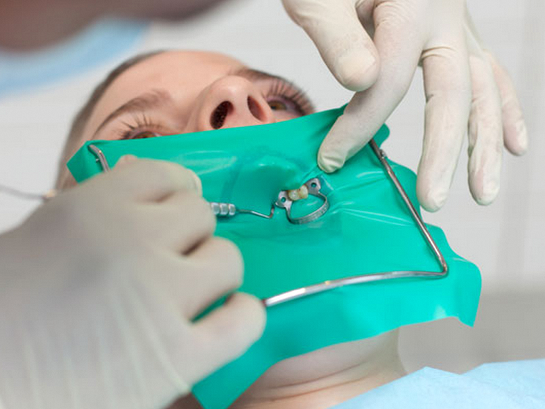 Why the Rubber Dam in Your Mouth Is Essential During Root Canal Treatment at a Dangsan Station Dental Clinic image 3